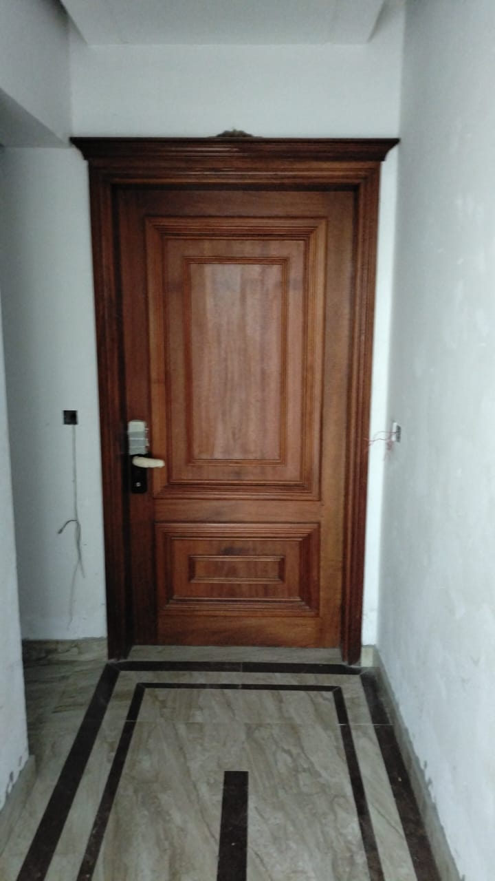 Image of carved timber door.